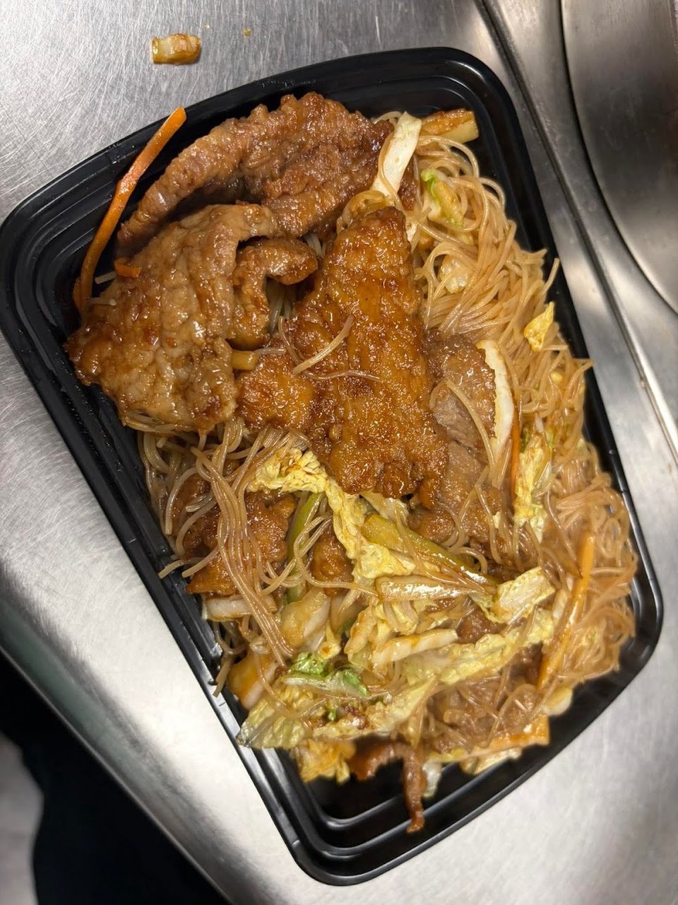 Menu sheet showing chow mein and chop suey.